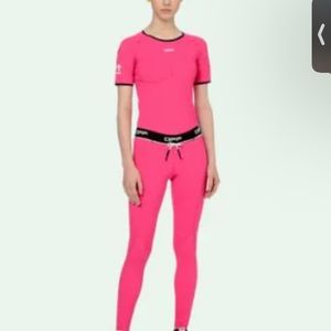 Size small gently used off white active set pink top and leggings included.